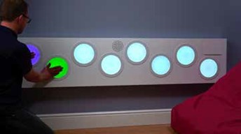 man playing with horizontal touch sound light panel