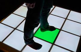 man on interactive floor sound light panel