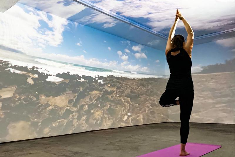 woman during yoga in broomx immersive room
